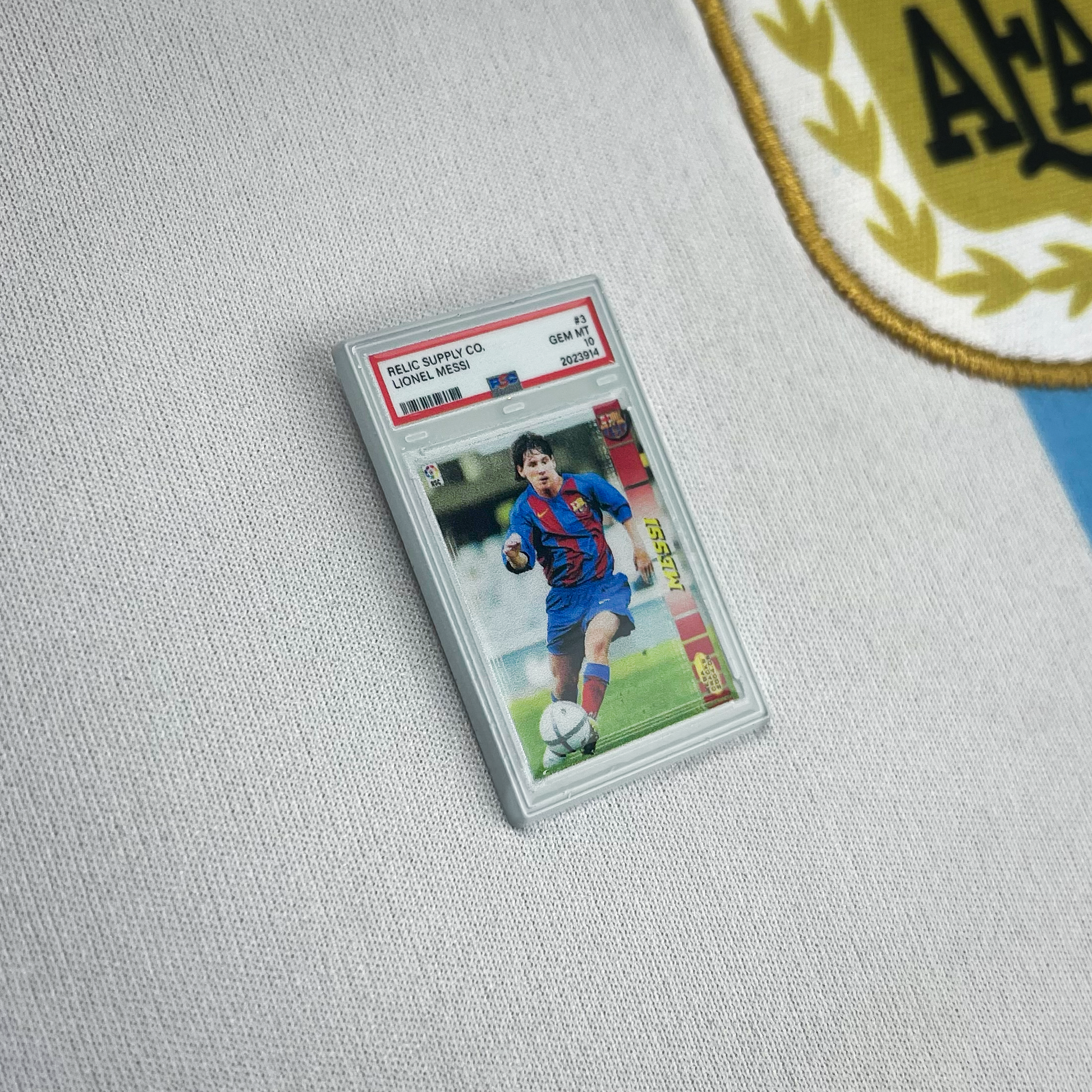 2004-05 Lionel Messi Rookie Graded Enamel Pin Relic Supply Co. 2004-05 Lionel Messi Rookie Graded Enamel Pin Relic Supply Co.